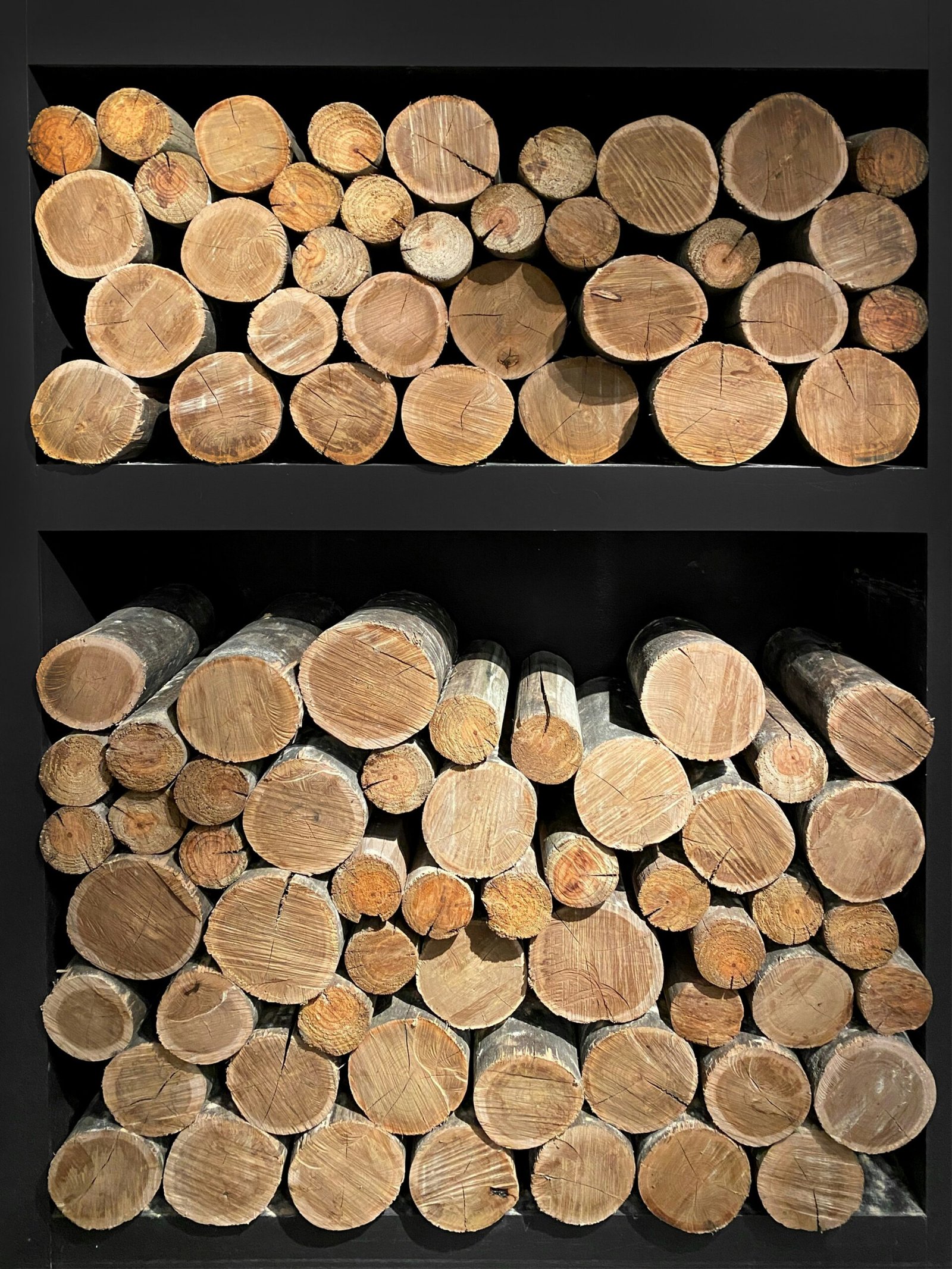 a bunch of logs stacked on top of each other